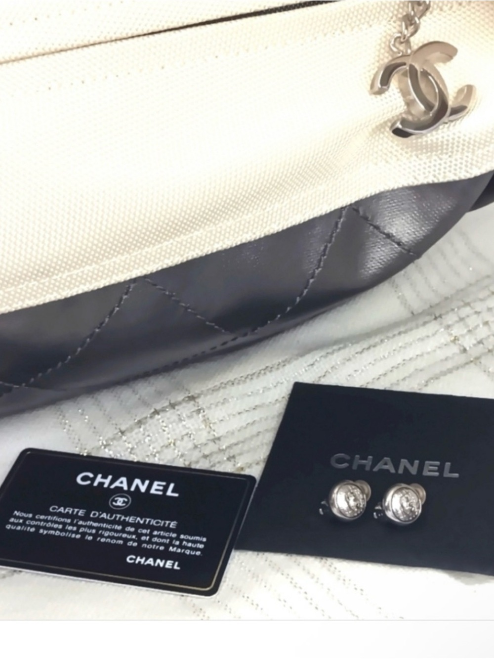 CHANEL Metallic Silver and Cream Quilted Leather Shoulder Bag &
CHANEL EARRINGS - Picture 4 of 13